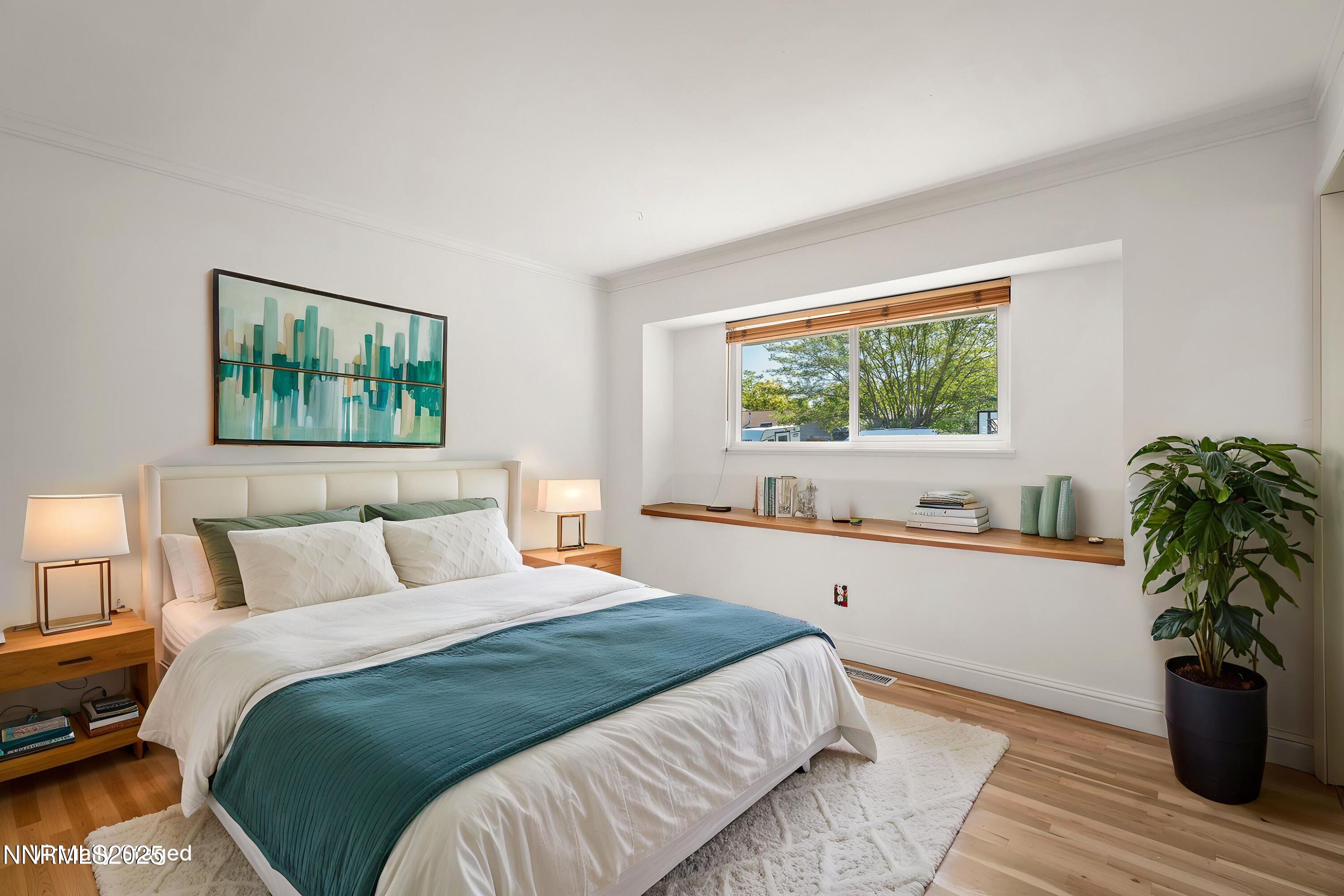 1420 Exeter Way Reno, NV 89503 - Photo 20 of 34 a bedroom with a bed and a large window