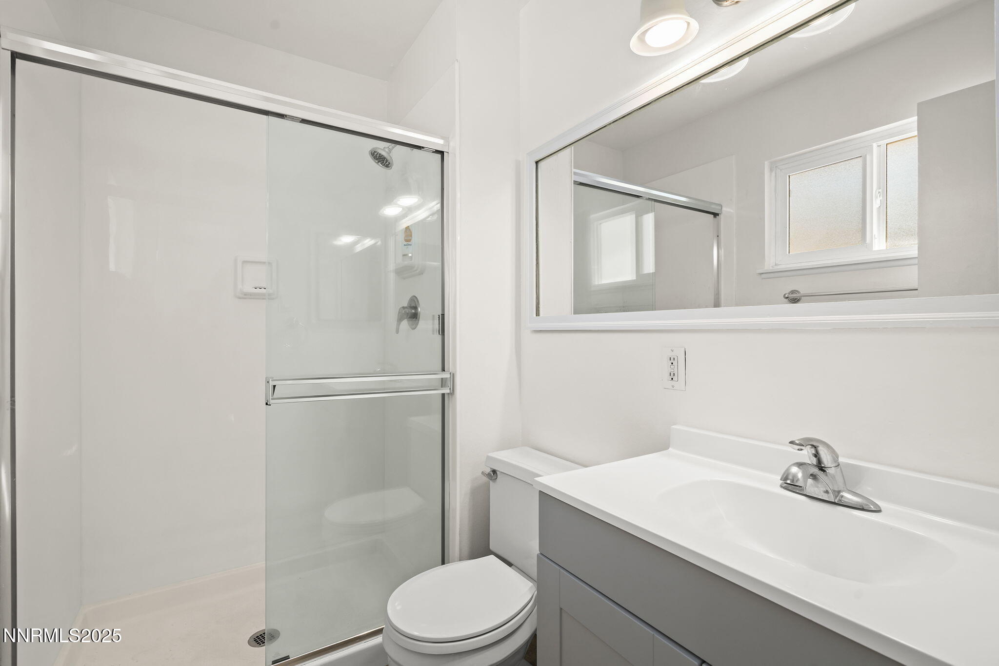 1420 Exeter Way Reno, NV 89503 - Photo 22 of 34 a bathroom with a sink a toilet and shower