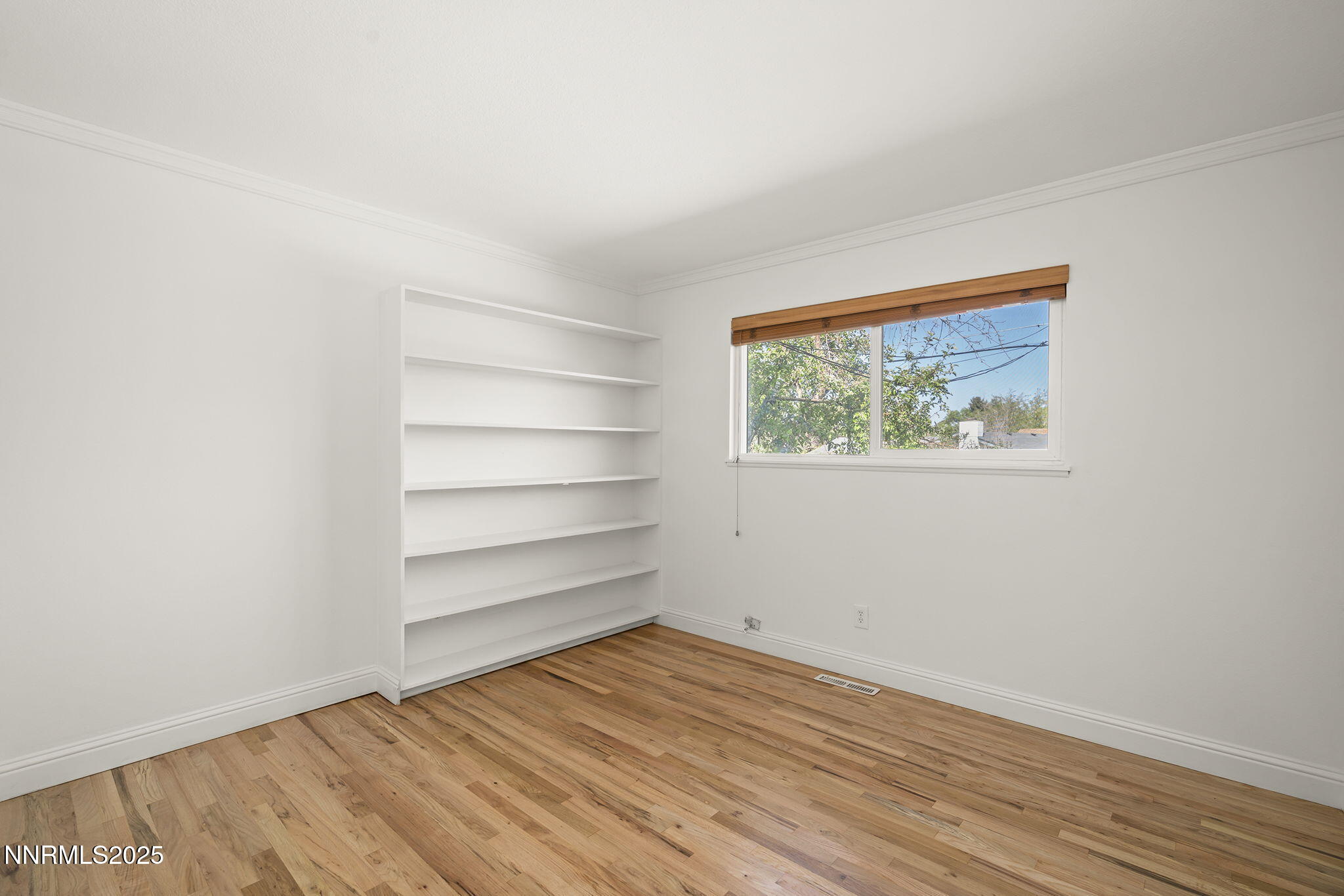 1420 Exeter Way Reno, NV 89503 - Photo 24 of 34 a view of a room with wooden floor and window