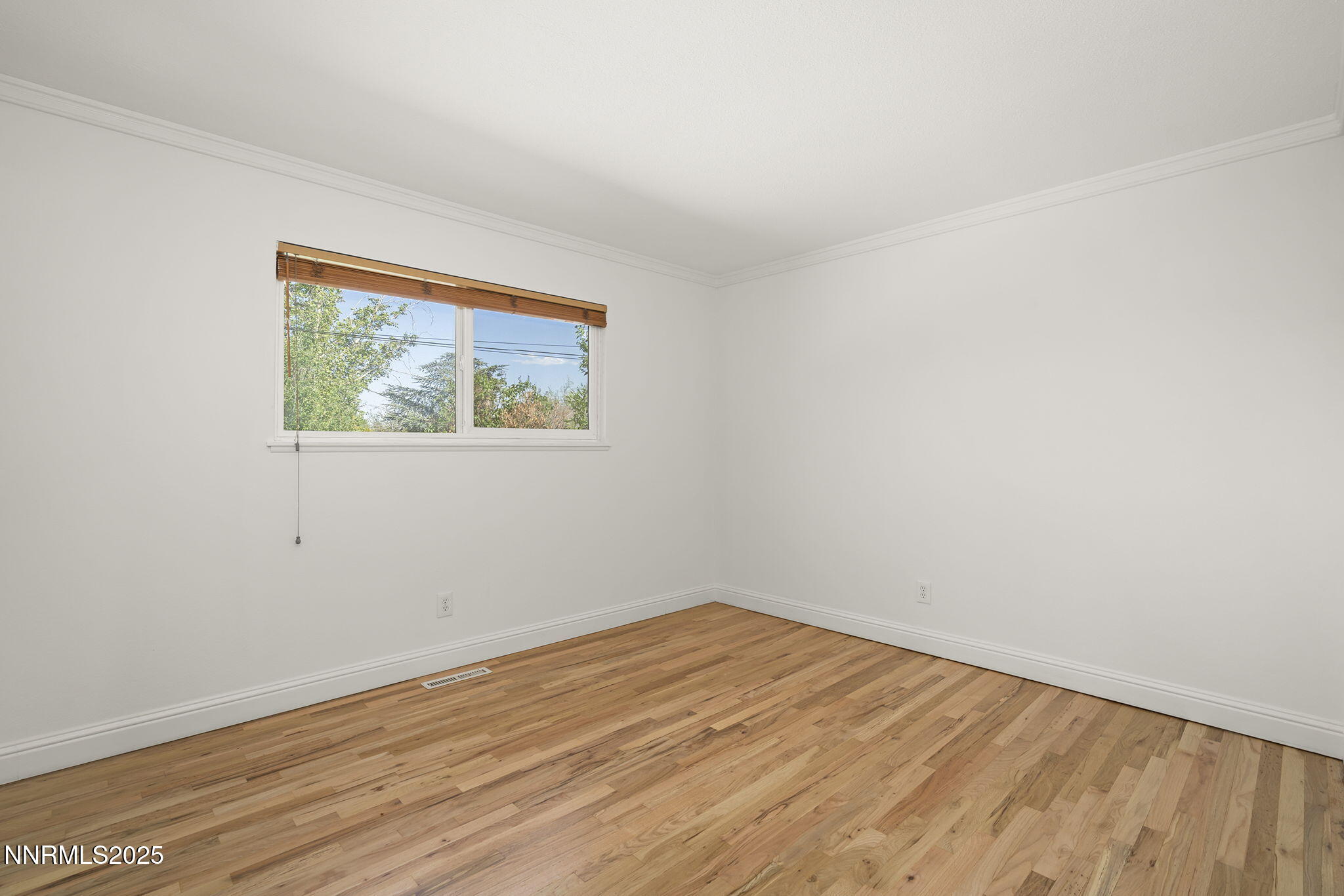 1420 Exeter Way Reno, NV 89503 - Photo 25 of 34 a view of empty room with wooden floor