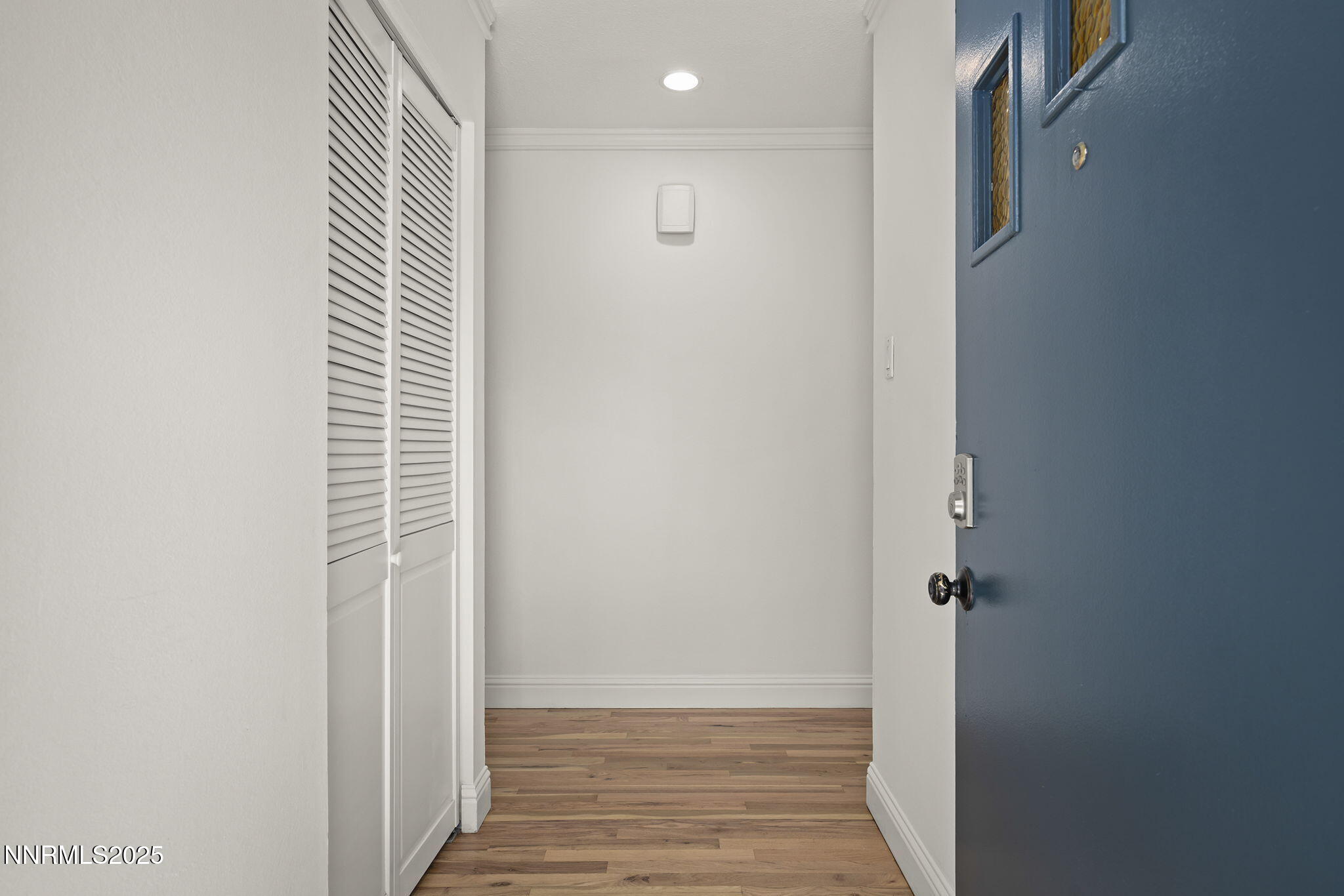 1420 Exeter Way Reno, NV 89503 - Photo 3 of 34 a view of a hallway with wooden floor