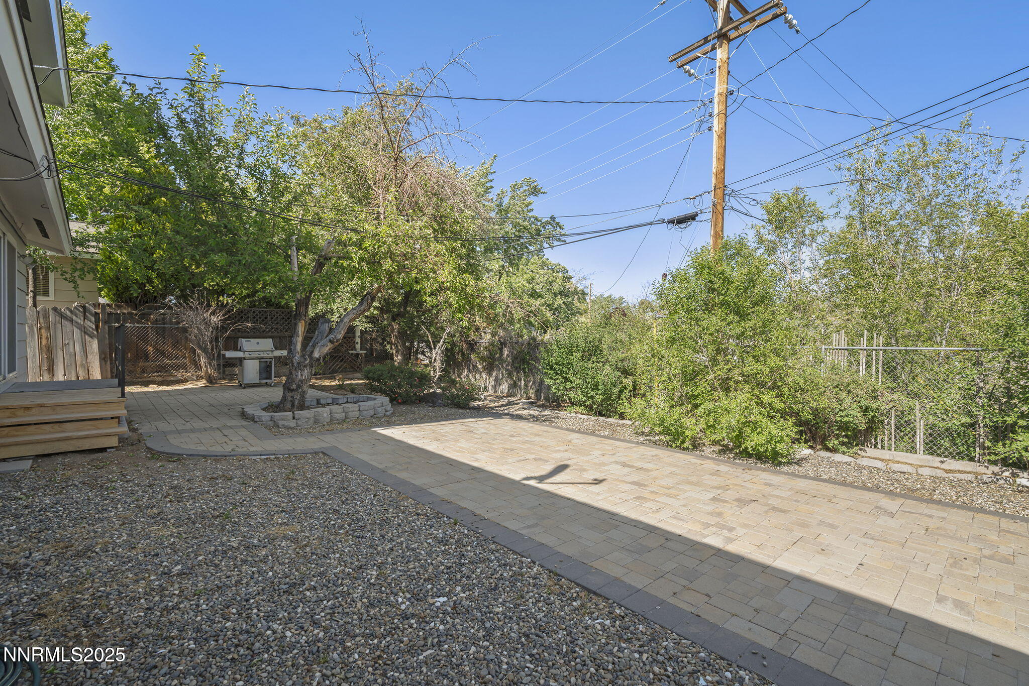 1420 Exeter Way Reno, NV 89503 - Photo 32 of 34 a backyard of a house with lots of green space