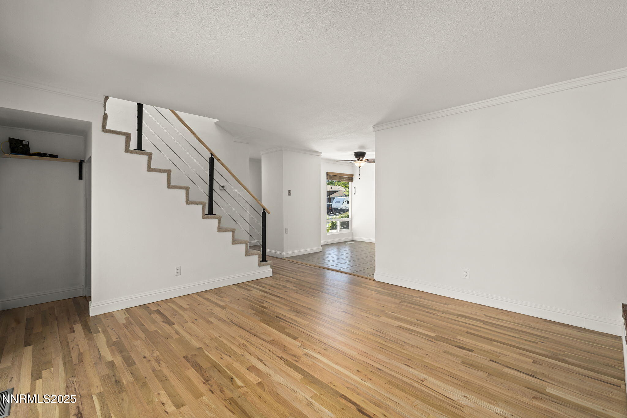 1420 Exeter Way Reno, NV 89503 - Photo 8 of 34 a view of empty room with wooden floor