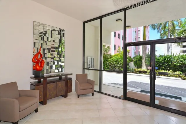 a view of a hallway with a white walls
