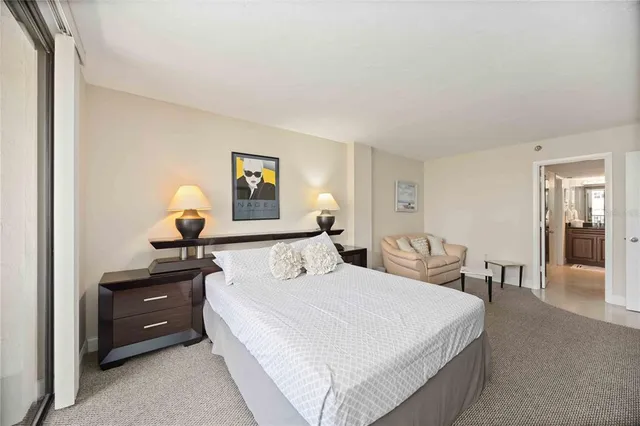 a bedroom with a bed and furniture