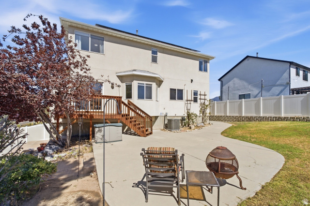 926 Ibis Way Draper, UT 84020 - Photo 32 of 41 Back wood deck leading to backyard with plenty of room to entertain, play with your kids or just relax.