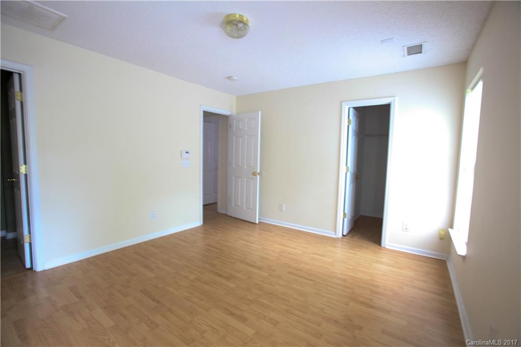 5004 Deerton Road Charlotte, NC 28269 - Photo 5 of 7 a view of an empty room