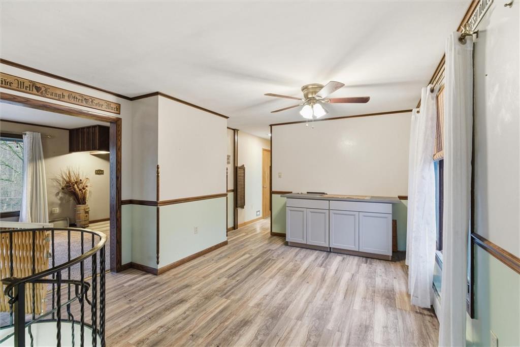 312 Flatwoods Road Vanderbilt, PA 15486 - Photo 15 of 50 a kitchen with granite countertop a refrigerator and a sink