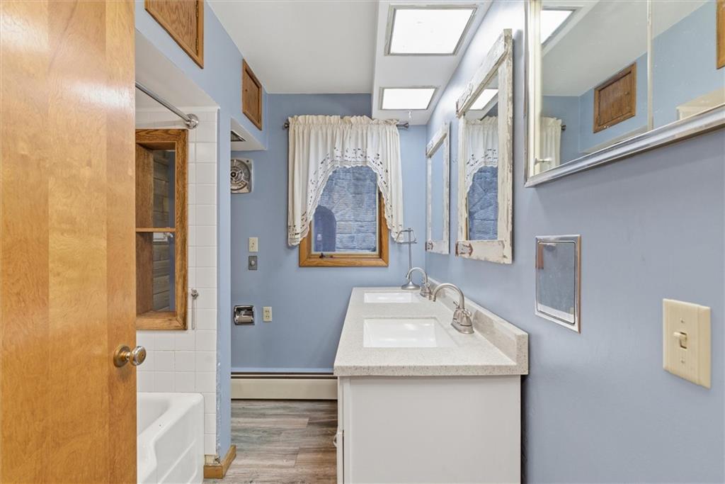 312 Flatwoods Road Vanderbilt, PA 15486 - Photo 19 of 50 a bathroom with a sink and a mirror