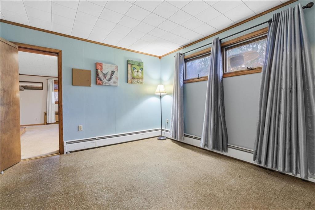 312 Flatwoods Road Vanderbilt, PA 15486 - Photo 22 of 49 an empty room with closet and a window