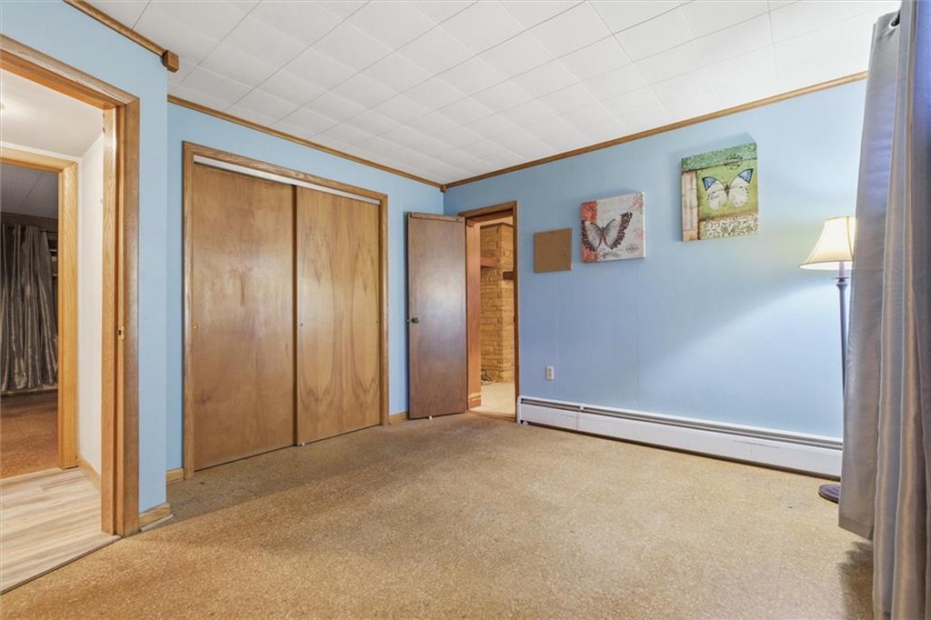 312 Flatwoods Road Vanderbilt, PA 15486 - Photo 23 of 49 an empty room with windows and closet