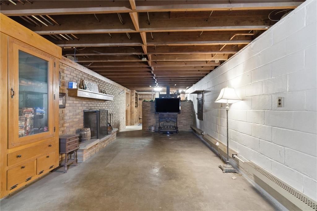 312 Flatwoods Road Vanderbilt, PA 15486 - Photo 39 of 49 a view of an empty room with wooden shelves