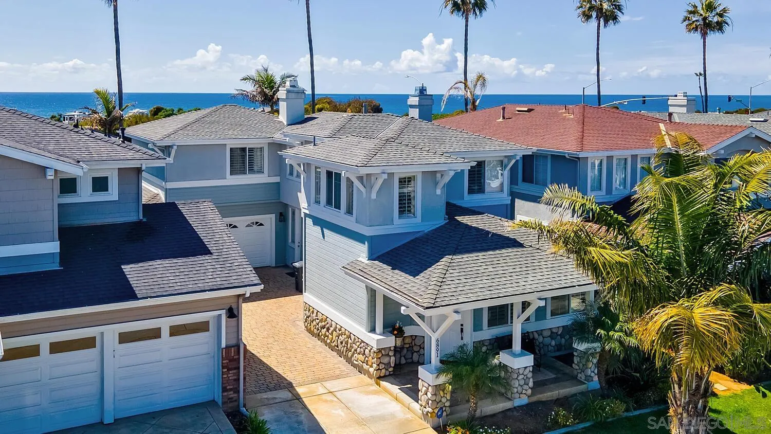 6891 Tradewinds Drive Carlsbad, CA 92011 - Photo 16 of 55 a view of a house with a sink and outdoor kitchen