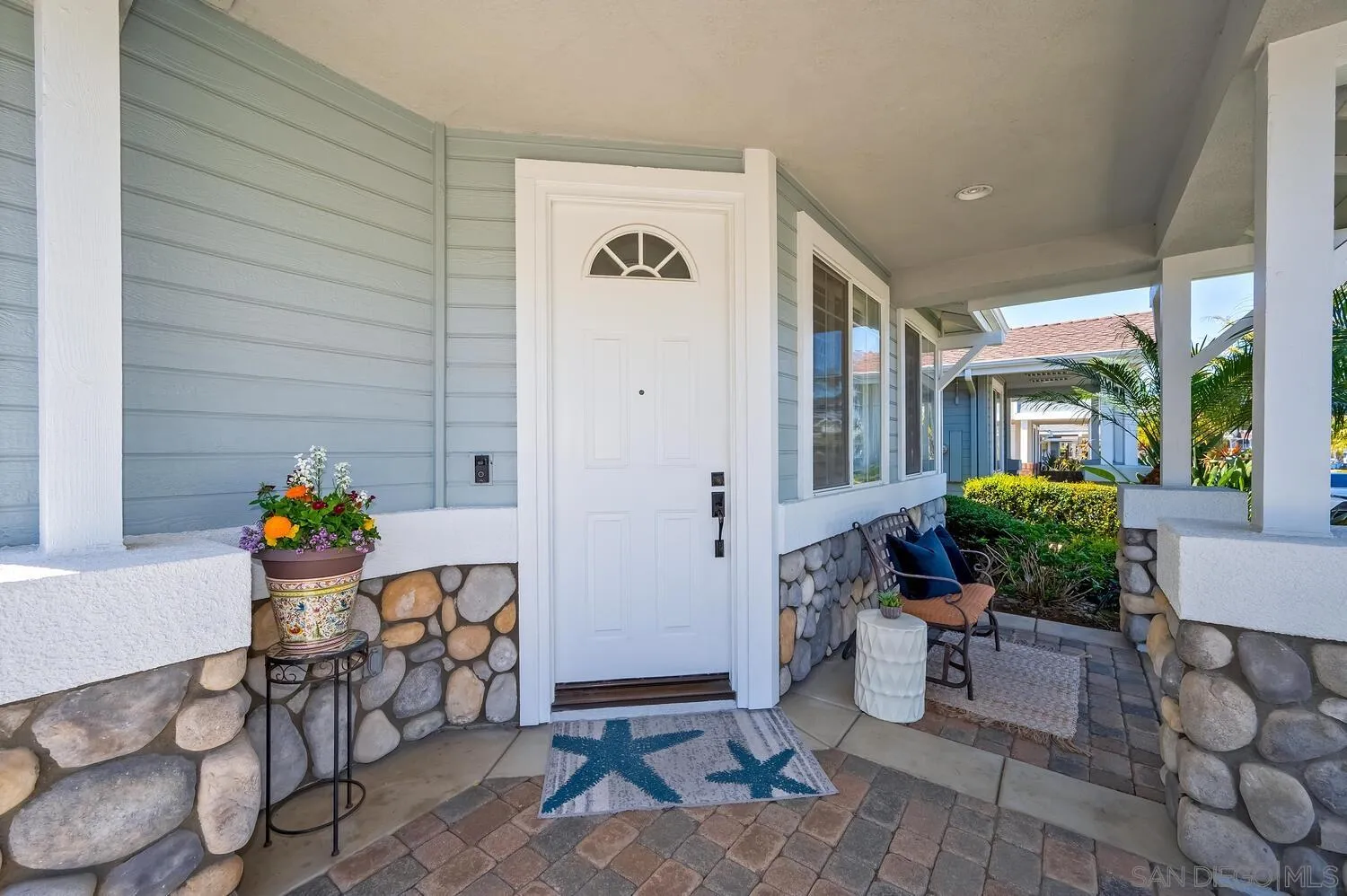 6891 Tradewinds Drive Carlsbad, CA 92011 - Photo 17 of 55 a view of an chairs and table in a patio