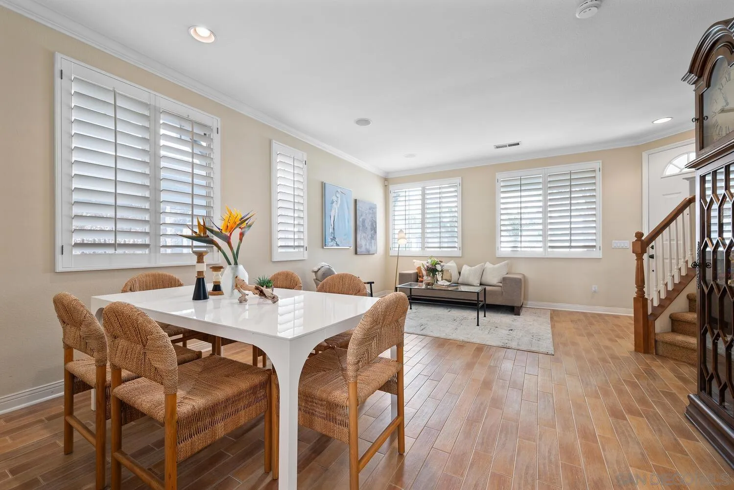 6891 Tradewinds Drive Carlsbad, CA 92011 - Photo 18 of 55 a view of a dining room with furniture window and wooden floor