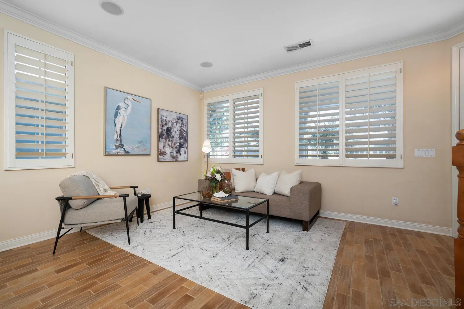 6891 Tradewinds Drive Carlsbad, CA 92011 - Photo 19 of 55 a living room with furniture and a window