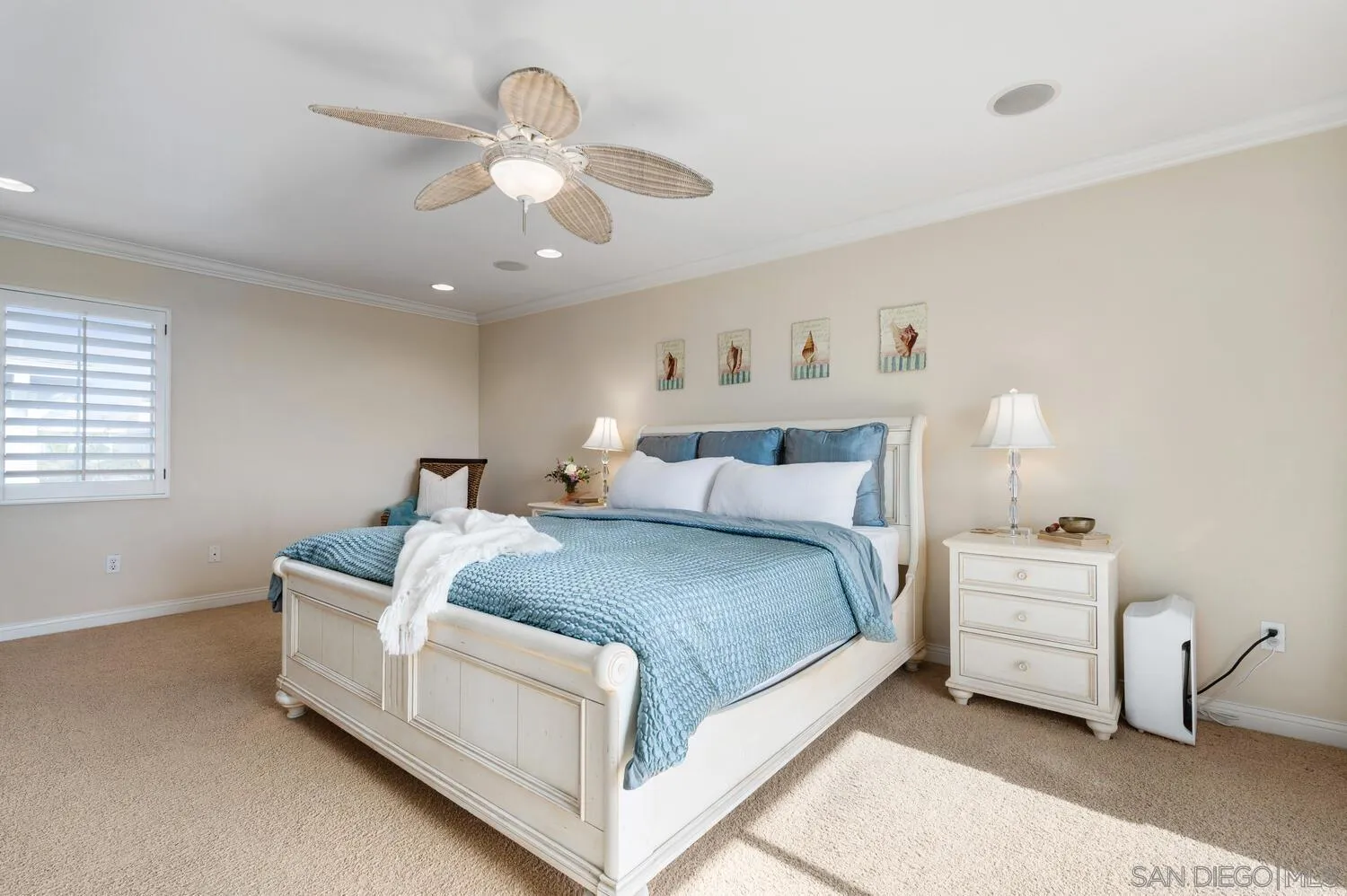 6891 Tradewinds Drive Carlsbad, CA 92011 - Photo 32 of 55 a bedroom with bed and window
