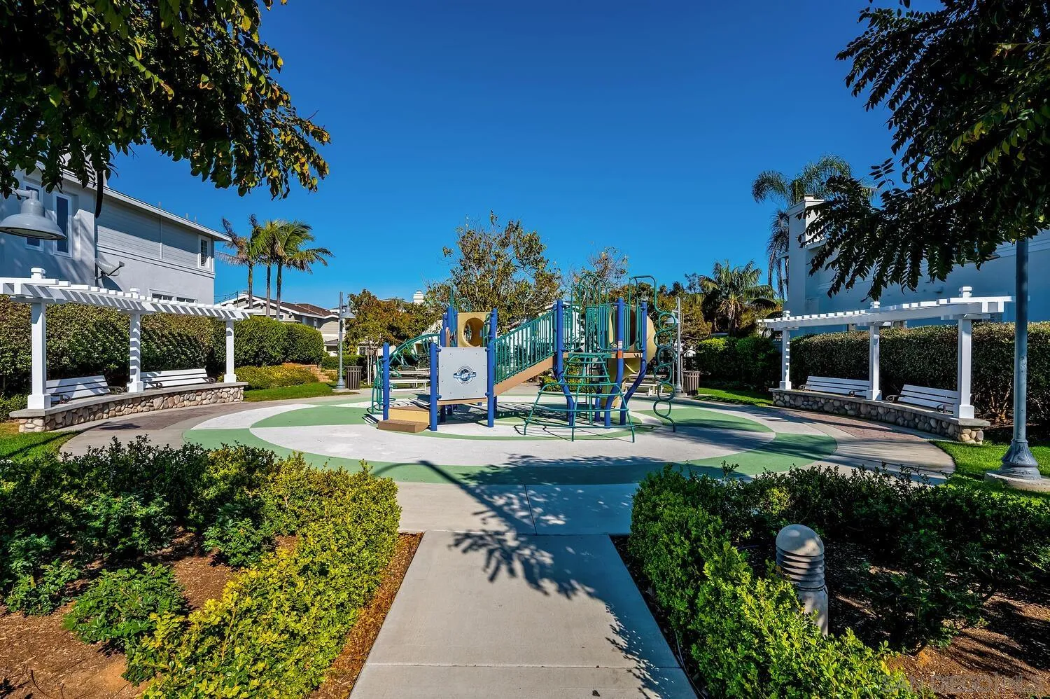 6891 Tradewinds Drive Carlsbad, CA 92011 - Photo 41 of 55 a view of a garden with palm trees