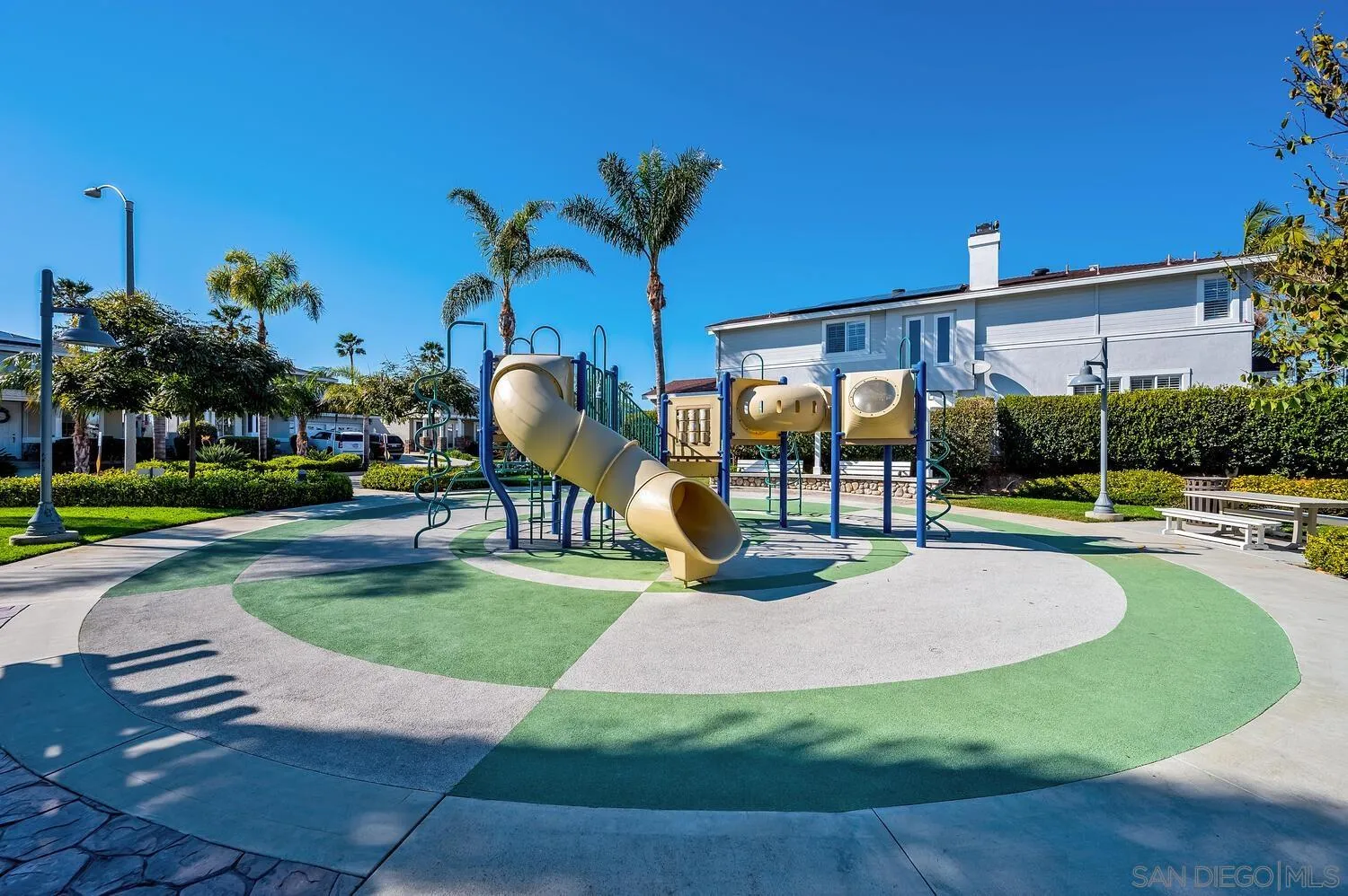 6891 Tradewinds Drive Carlsbad, CA 92011 - Photo 44 of 55 a view of a swimming pool with a patio