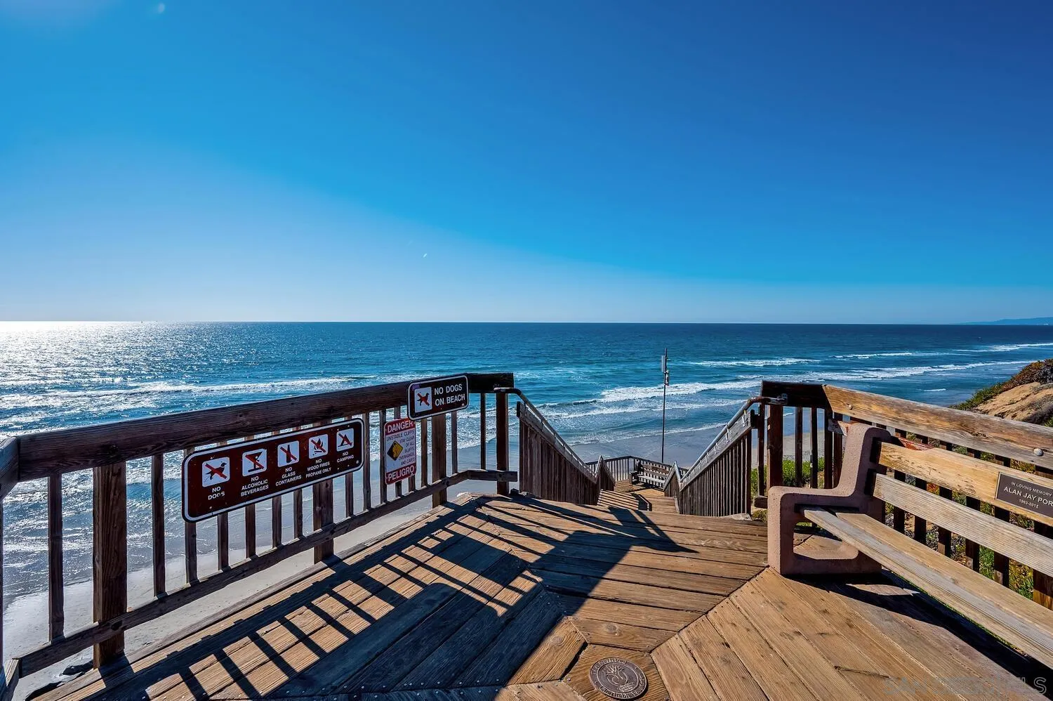 6891 Tradewinds Drive Carlsbad, CA 92011 - Photo 54 of 55 a view of a balcony with wooden floor and outdoor space