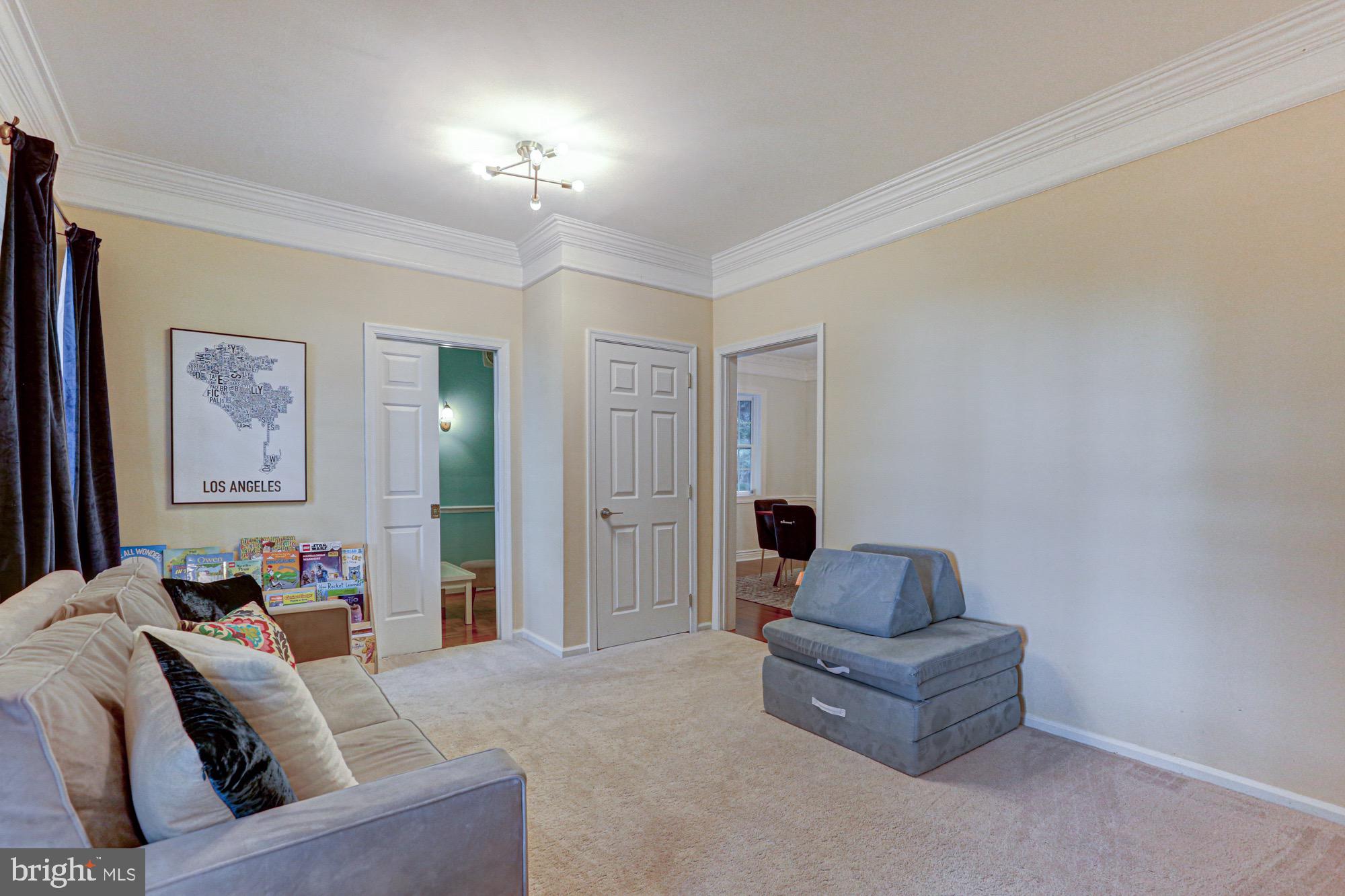 104 Dungarvan Drive Middletown, DE 19709 - Photo 11 of 45 a living room with furniture and a lamp
