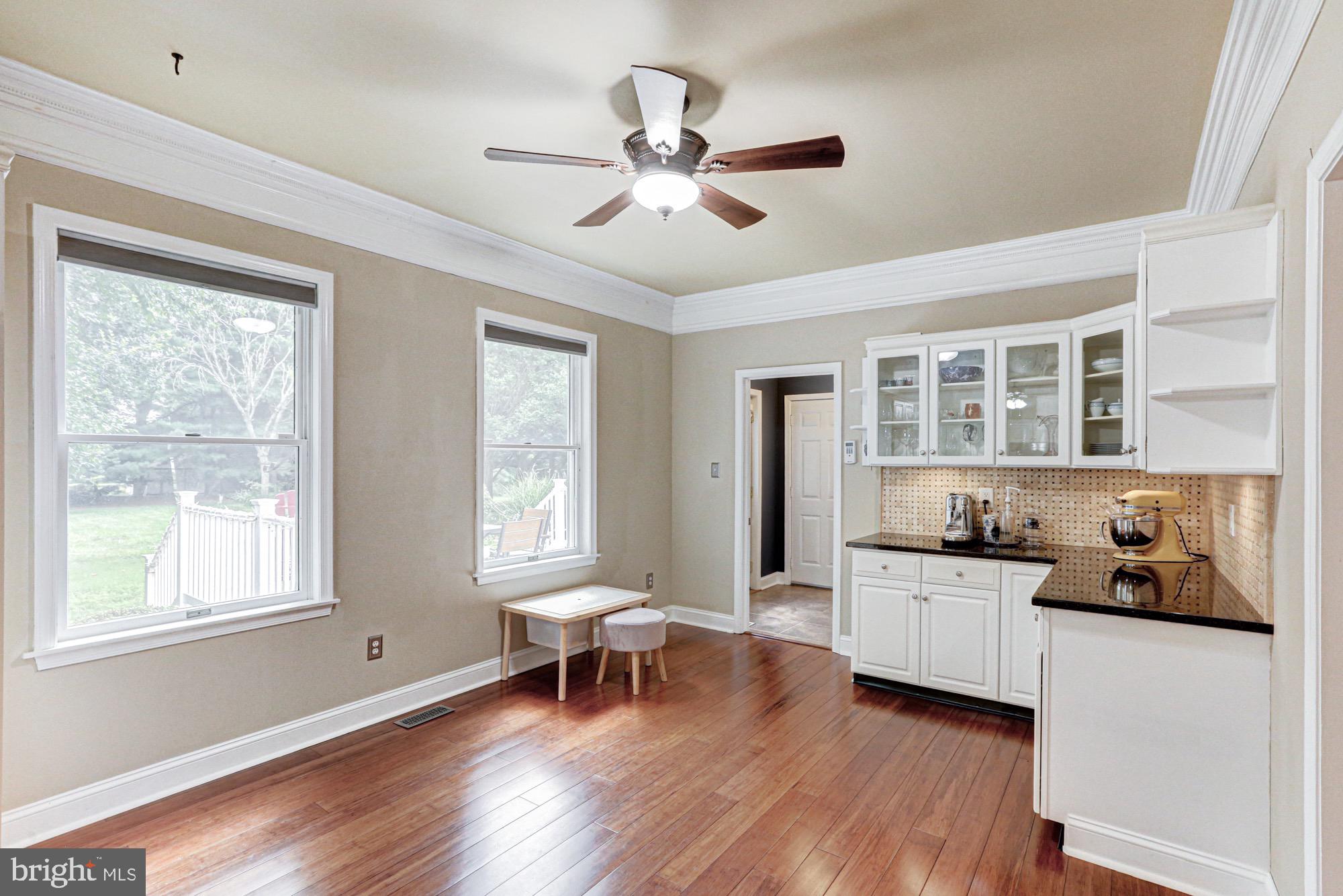 104 Dungarvan Drive Middletown, DE 19709 - Photo 19 of 45 a workspace with wooden floor and windows