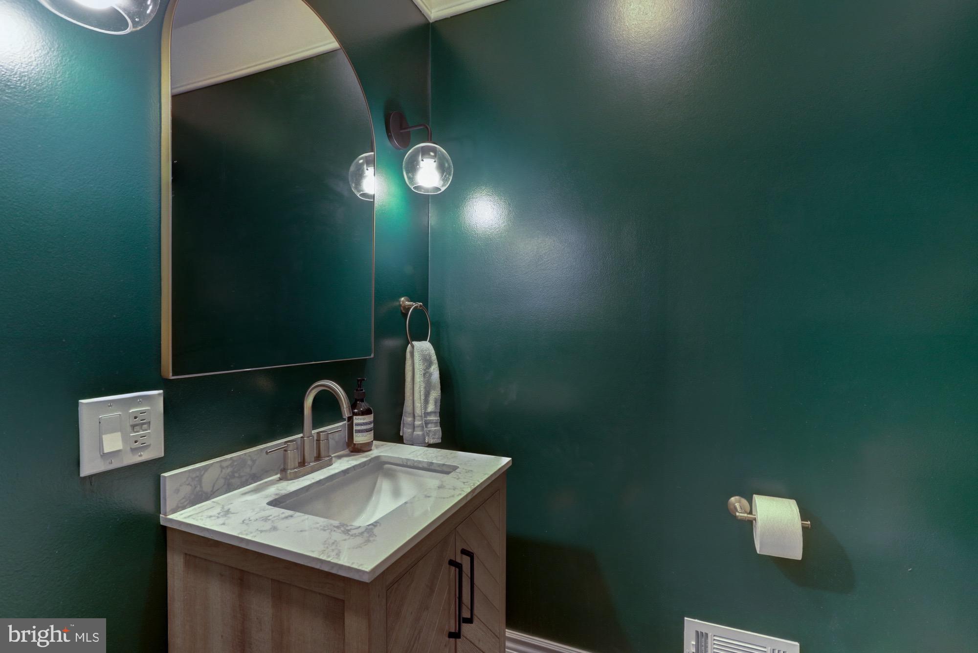 104 Dungarvan Drive Middletown, DE 19709 - Photo 26 of 45 a bathroom with a sink toilet and mirror