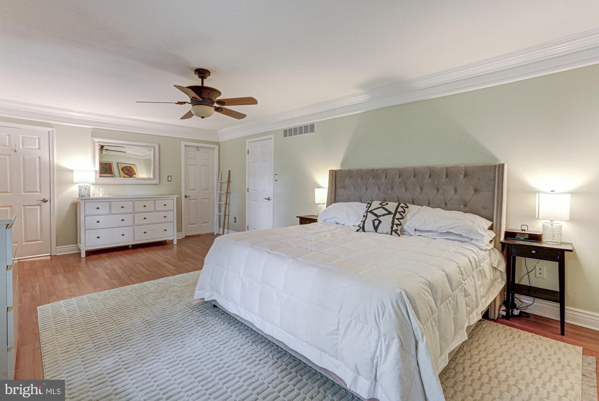 104 Dungarvan Drive Middletown, DE 19709 - Photo 29 of 45 a spacious bedroom with a bed and a dresser