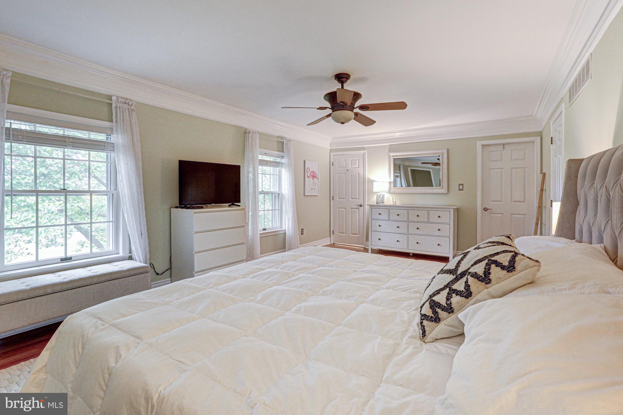 104 Dungarvan Drive Middletown, DE 19709 - Photo 30 of 45 a bedroom with a bed a flat tv screen and a dresser