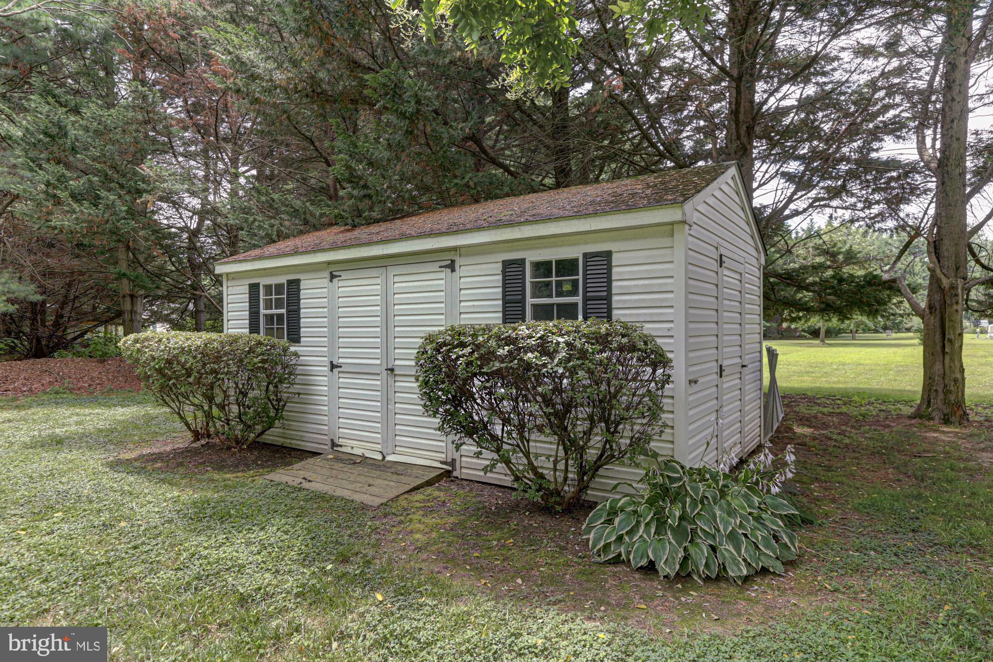 104 Dungarvan Drive Middletown, DE 19709 - Photo 7 of 45 a view of a house with a yard and a large tree