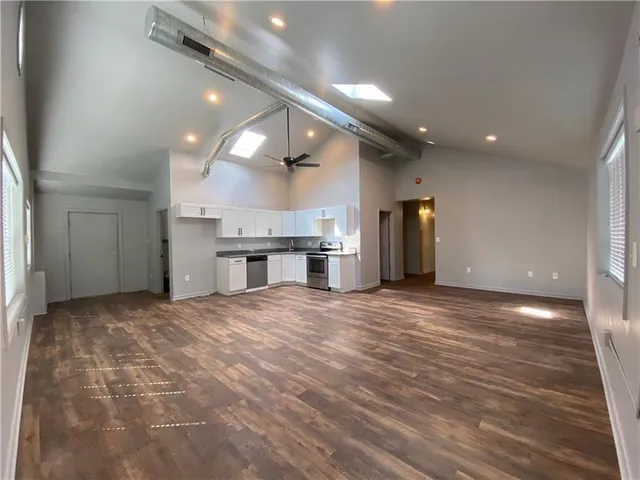 a view of a kitchen with a sink and a kitchen