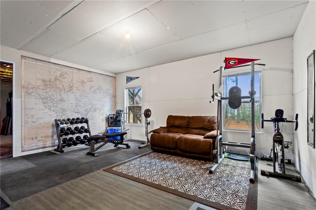 156 Starry Night Way Dallas, GA 30132 - Photo 18 of 28 a living room with furniture and a window