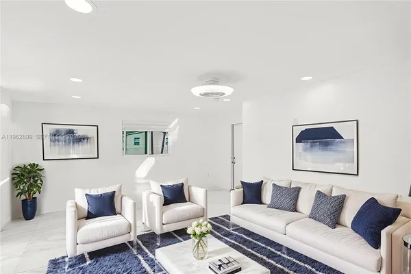 a living room with furniture and a couch
