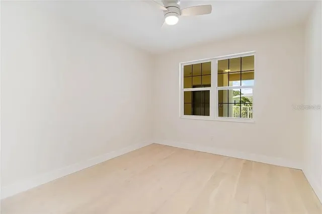 an empty room with windows