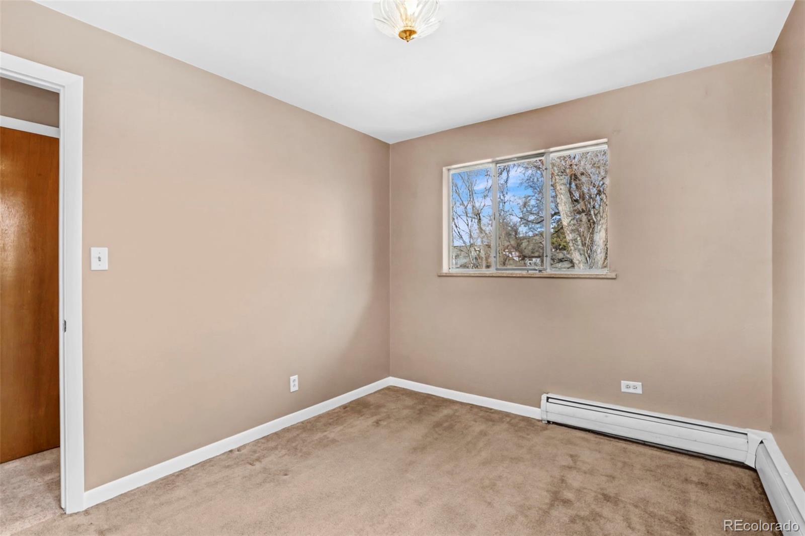 200 East Myrtle Street, Unit 8 Fort Collins, CO 80524 - Photo 14 of 21 an empty room with a window