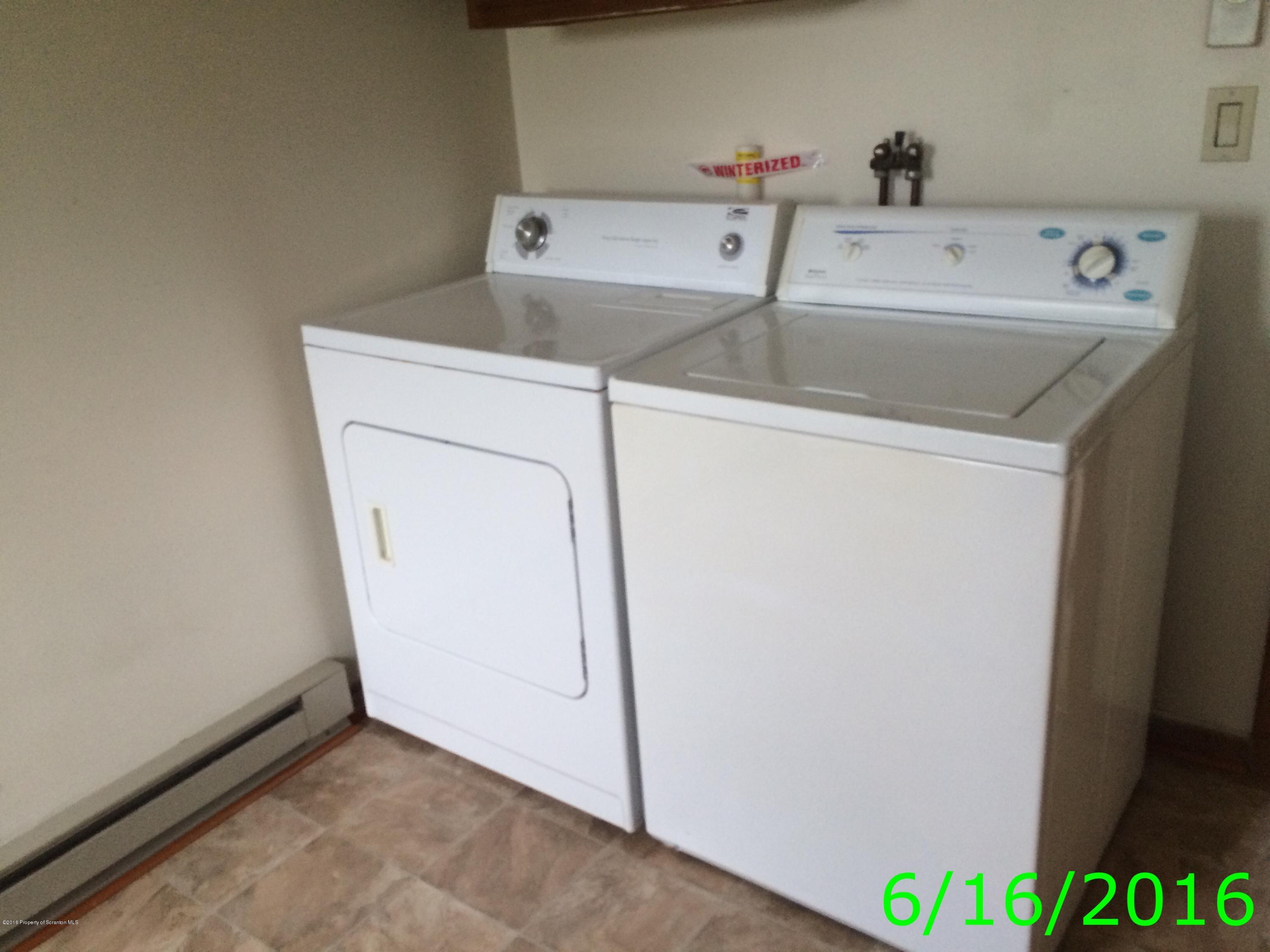 297 J&j Road Moscow, PA 18444 - Photo 14 of 25 a utility room with dryer and washer