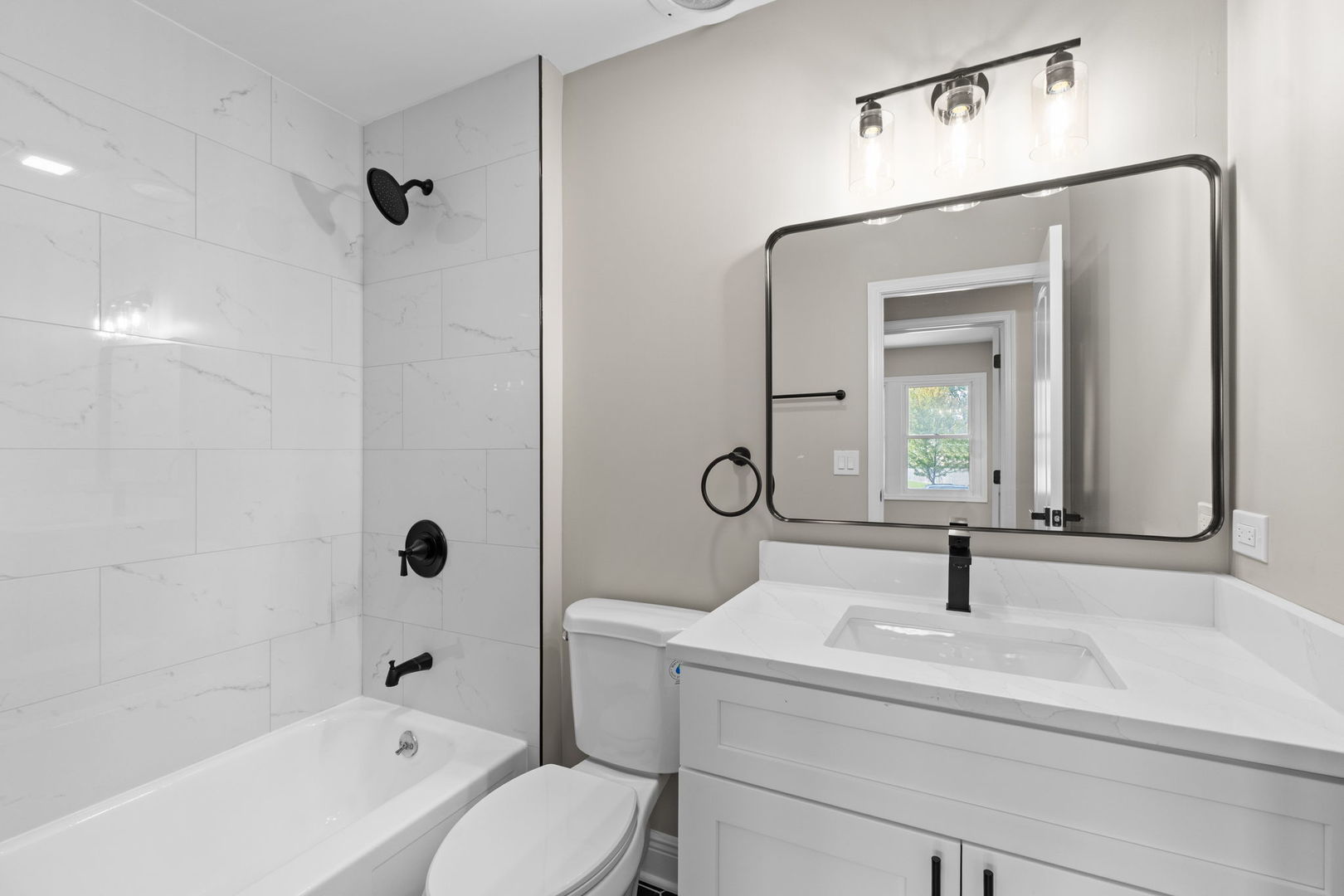 1180 Cobble Hill Court Hoffman Estates, IL 60169 - Photo 14 of 34 a bathroom with a sink a toilet and shower