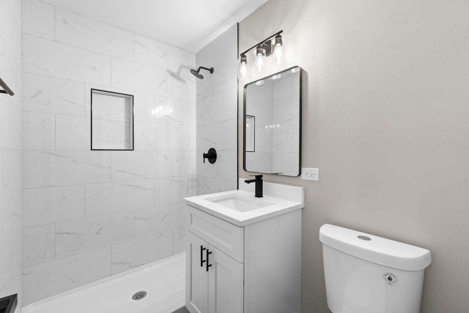 1180 Cobble Hill Court Hoffman Estates, IL 60169 - Photo 26 of 34 a bathroom with a sink a toilet and shower
