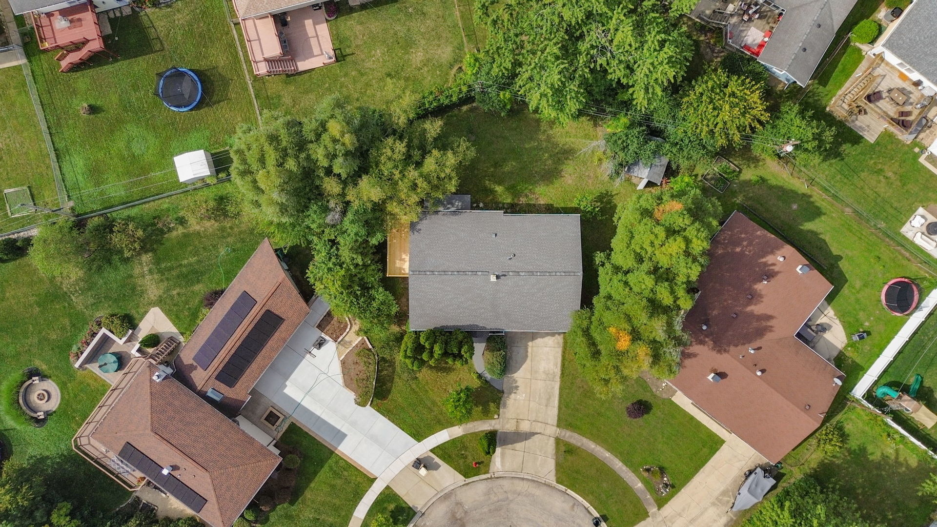 1180 Cobble Hill Court Hoffman Estates, IL 60169 - Photo 3 of 34 an aerial view of a house with a garden and yard