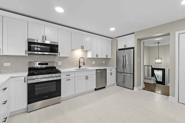 a view of room with window and cabinet