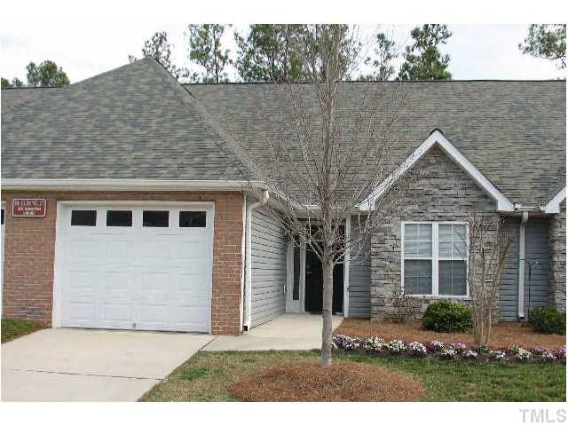 11331 Involute Place, Unit 101 Raleigh, NC 27617 - Photo 1 of 4 front view of a house with a yard