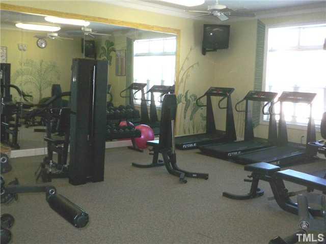 11331 Involute Place, Unit 101 Raleigh, NC 27617 - Photo 4 of 4 a room with gym equipment