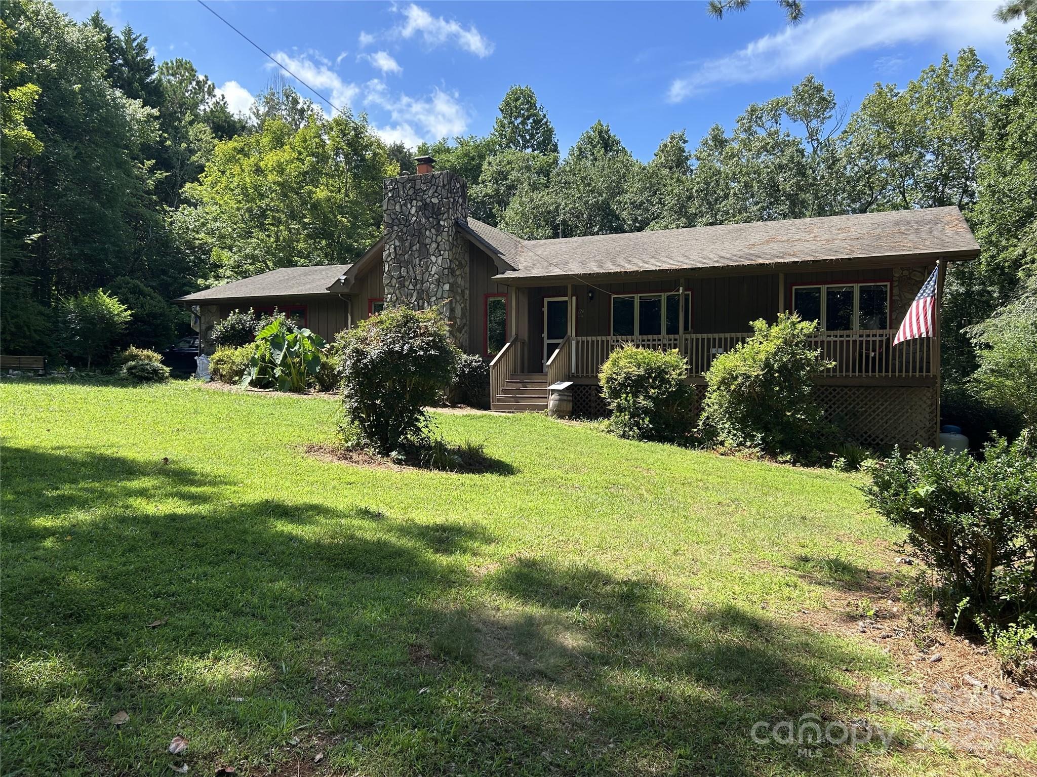 124 Blue Ridge Drive Rutherfordton, NC 28139 - Photo 1 of 48 a front view of house with yard and green space