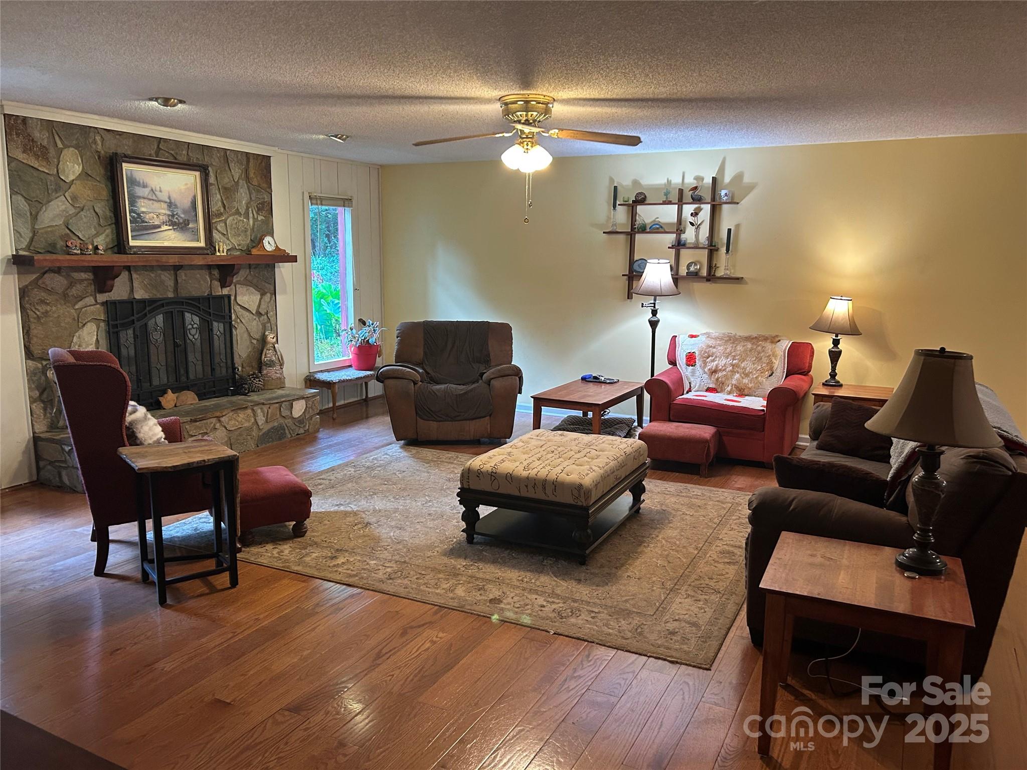 124 Blue Ridge Drive Rutherfordton, NC 28139 - Photo 11 of 48 a living room with furniture and a wooden floor