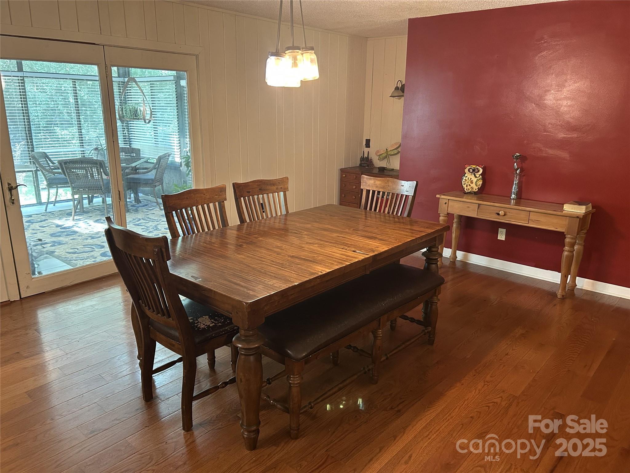 124 Blue Ridge Drive Rutherfordton, NC 28139 - Photo 12 of 48 a dining room with furniture a chandelier and wooden floor