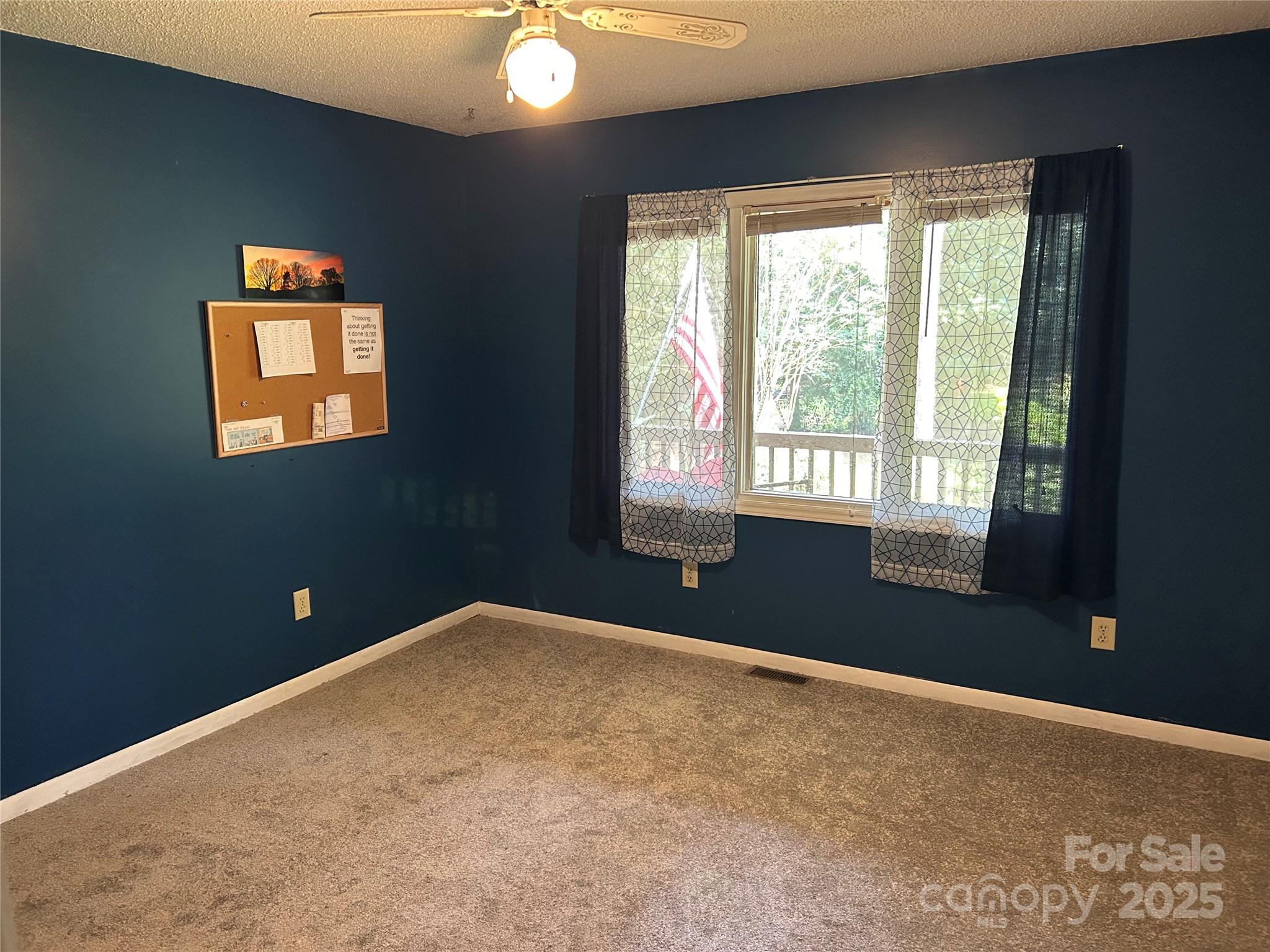 124 Blue Ridge Drive Rutherfordton, NC 28139 - Photo 31 of 48 a view of an empty room with a window