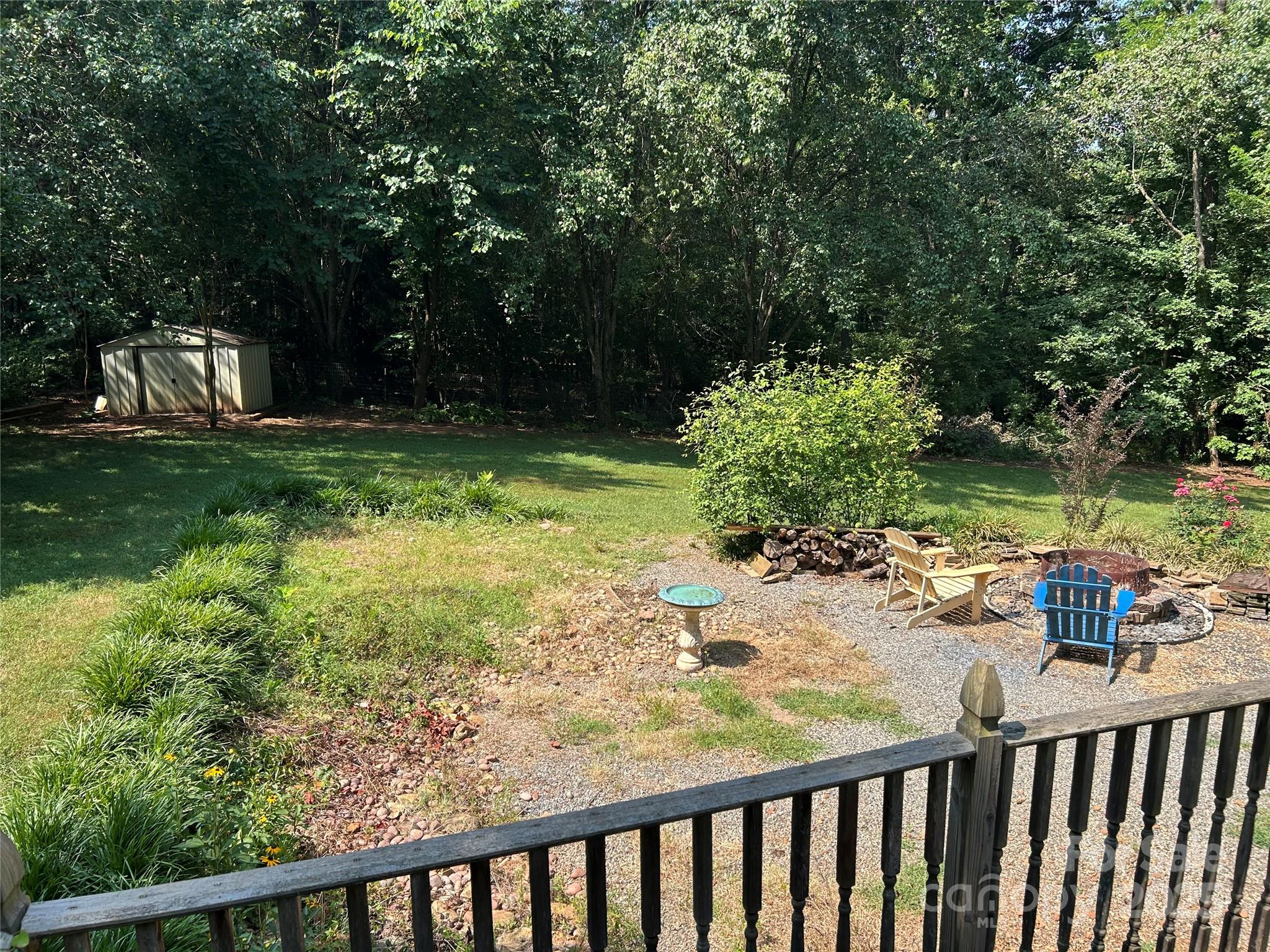 124 Blue Ridge Drive Rutherfordton, NC 28139 - Photo 37 of 48 a view of a backyard with large trees
