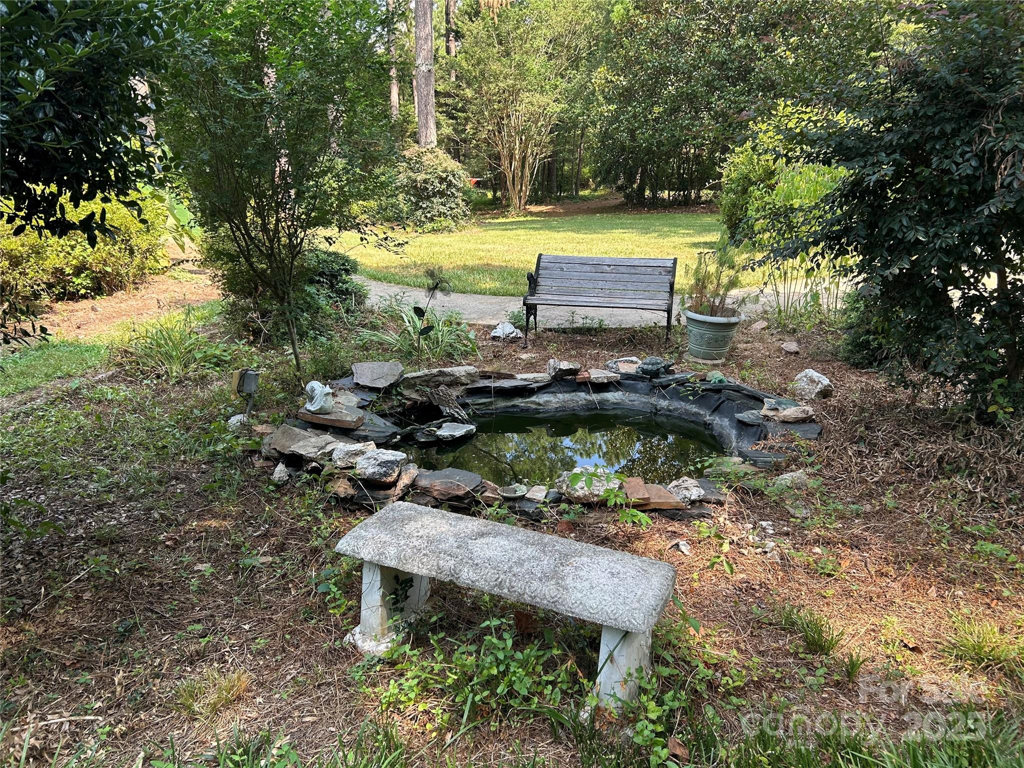 124 Blue Ridge Drive Rutherfordton, NC 28139 - Photo 5 of 48 a garden view with a seating space