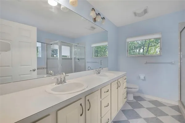 a white bath tub sitting next to a window