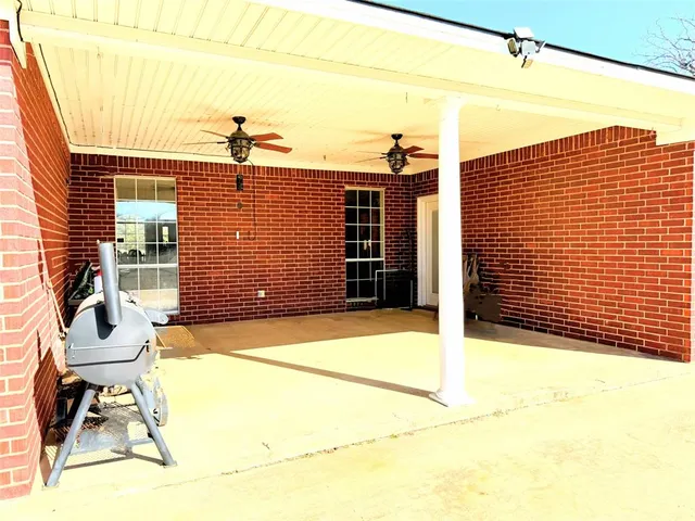 a view of porch with patio